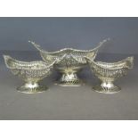 A silver three piece sweet meat centre service of pierced quatrefoil form with hairbell swags -