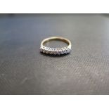 An 18ct gold diamond nine stone ring - Hallmarked London - Ring size M 1/2 - Weight approx