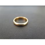 A 22ct gold band ring - Hallmarked Birmingham - Ring size K - Weight approx 3.9gms
Condition