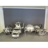 A large quantity of silver plated wear - two tea services and server including tea, coffee, milk