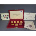 A set of - The Coronation Issue - commemorative silver gilt stamps - 9p, 10 1/2p, 11p, 13p, 2 1/2