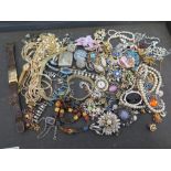 An assortment of vintage and costume jewellery - Together with a vesta case and two watches