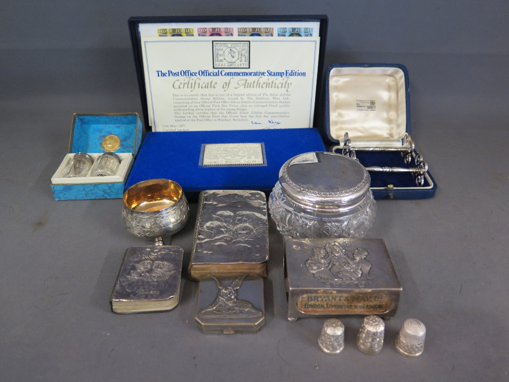 A selection of silver items including hallmarked gilt tined salt, thimbles, two silver hallmarked
