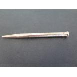 A 9 ct gold propelling pencil - Hallmarked Birmingham 1933 by E. Baker & Sons - Weight approx. 12.4