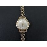 ENICAR a ladies gold plated wristwatch - To the bracelet strap stamped 375 - Length 18cms - Weight