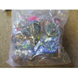 A mixed sealed bag of costume jewellery