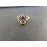 A 9ct gold smokey quartz single-stone ring - Hallmarked Birmingham - Ring size L - Weight approx