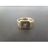 A 9ct gold signet ring - With diamond highlight - Hallmarked Birmingham - Ring size P 1/2 - Weight