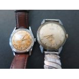 A Gents Tissot Camping wristwatch in chromed case on a leather strap - running in Auction and a