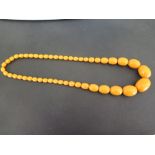 A bakelite bead necklace - Length 60cms - Weight approx 65.2gms
Condition Report: Good