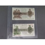 A George V one pound note and a ten shilling note- 1922/1923