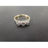 An old-cut diamond three-stone ring - Stamped 18ct - Ring size N - Weight approx 3.0gms
Condition