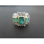 An emerald and diamond cluster ring - The rectangular and square-shape emeralds within a