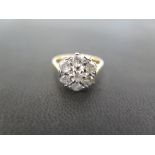 An 18ct gold brilliant-cut diamond daisy cluster ring - Estimated total diamond weight 1ct -