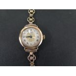 FERDERAL a ladies 9ct gold cocktail watch - With foliate detail and Roman numerals to the