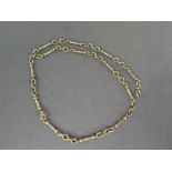 A 9 ct gold necklace - Weight approx. 18 grms - Length 42 cm
Condition report: Acid mark to one