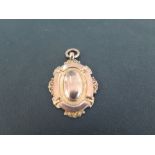 A mid 20th century 9ct gold pendant medal  - With reverse inscription dated 1949 - Stamped 9ct -