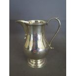 An Asprey silver presentation cream jug - London 1970/71 - Weight approx. 6.5 troy oz - Height 12