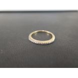 A diamond half-circle ring - Stamped 375 - Ring size Q - Weight approx 1.8gms
Condition Report: