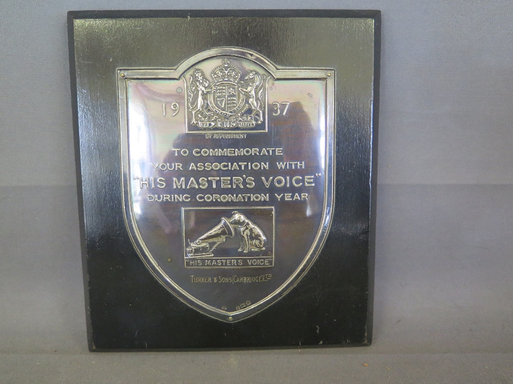 A hallmarked silver plaque given to Turner and Sons Cambridge Ltd to Commemorate your association