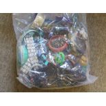 A mixed sealed bag of costume jewellery