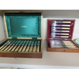 A boxed Fish set - silver collars and a boxed twelve set Dessert cutlery - silver collars