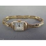 A 9 ct gold ladies - Derrick - side wind cocktail watch with a sprung strap - Total weight approx.