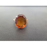 A citrine dress ring - Stamped 9ct - Ring size K - Weight approx 3.4gms
Condition Report: Good -