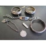 A collection of silver items - To include a bangle - two bracelets - Silver salts and spoon - All