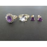 A 9ct gold purple and white-gem cluster ring - Hallmarked London - Ring size N - A cubic zirconia