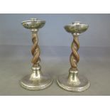 A pair of hallmarked silver candlesticks marked  for Sheffield 1919-20 and a pair of hallmarked