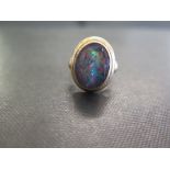 An opal triplet ring - Stamped 18ct - Ring size M 1/2 - Weight approx 6.3gms
Condition Report: Good