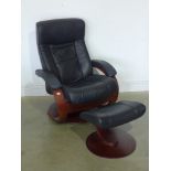 A modern leather adjustable chair with foot stool