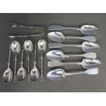 A set of six Victorian silver apostle spoons - Sheffield 1876 and a set of matching sugar tongs