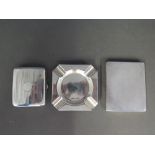 A silver hallmarked ashtray and two silver cigarette cases - Weight approx.