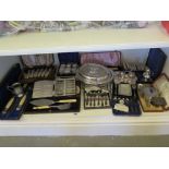 A large collection of silver plated ware and boxed cutlery etc including fish sets and servers etc.