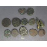 Eleven Roman bronze coins and two arrow heads