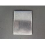 A hallmarked silver cigarette case - Weight approx. 5.