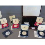 A collection of six silver proof Royal Mint Crowns,