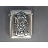 A silver Vesta - with embossed portrait decoration,