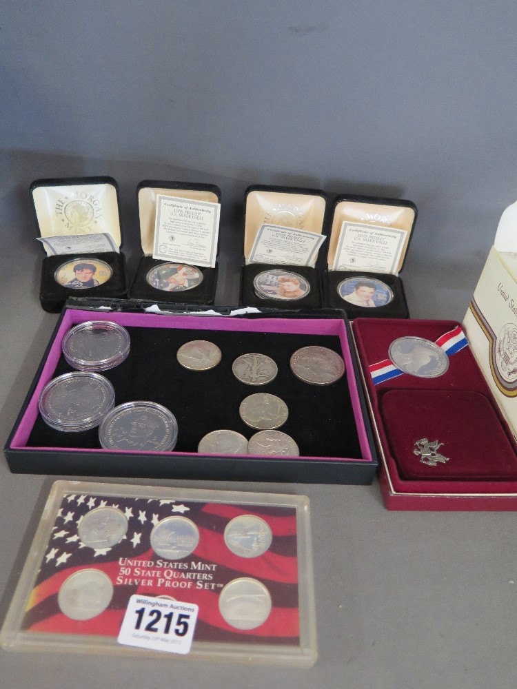 A collection of United States silver coins to include 50 State Quarter silver proof set,