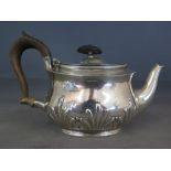 A small silver teapot decorated with embossed foliate design - Hallmark London 1895 - 96 - Weight