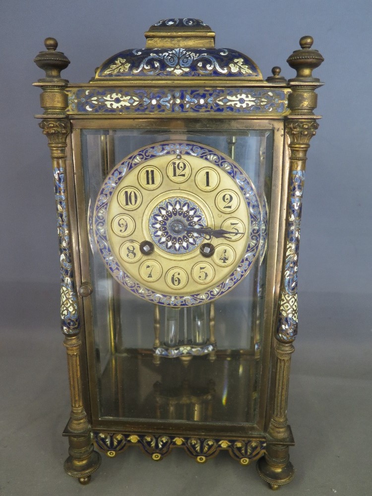 A good quality four glass gilt brass French Champleve enamel mantel clock with a 10cm dial,