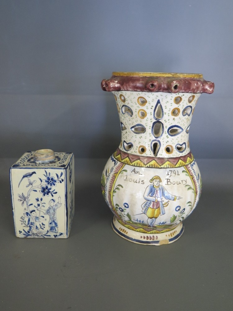 A Delft blue and white square form tea caddy minus lid, decorated with Chinese figures,