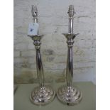 A pair of nicklel plated table lamps - H