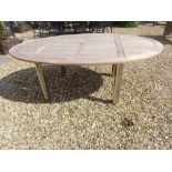 A Bramblecrest Banbury teak table and 8