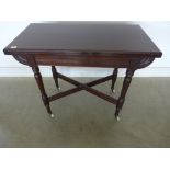 A Victorian mahogany swivel top fold ove