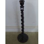 A good ebonised candlestick circa 1900 -