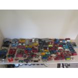 A quantity of model vehicles and associated items including Corgi, Lesney etc. approx.
