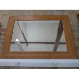 A large modern pine framed mirror - Height 1.